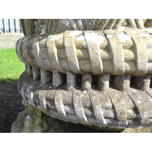 822 - Garden / Architectural : a large 19thC ornate stone urn planter, the upper section with weaved decor... 