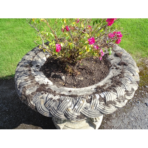 822 - Garden / Architectural : a large 19thC ornate stone urn planter, the upper section with weaved decor... 