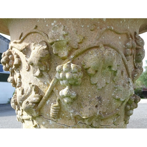 823 - Garden / Architectural: a large 19thC ornate stone urn planter, of classical form with fruiting vine... 