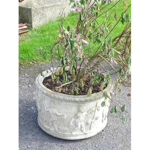 824 - Garden / Architectural: a large early to mid 20thC planter, with cherub decoration, approx 24