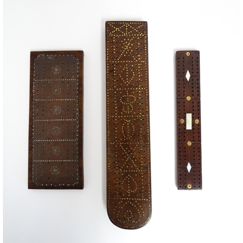 857 - Toys: Three cribbage boards comprising one with a copper mount decorated with flowers, one with inla... 