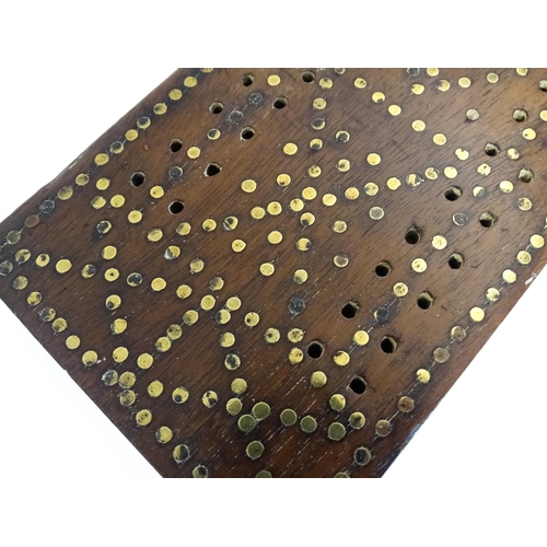 857 - Toys: Three cribbage boards comprising one with a copper mount decorated with flowers, one with inla... 