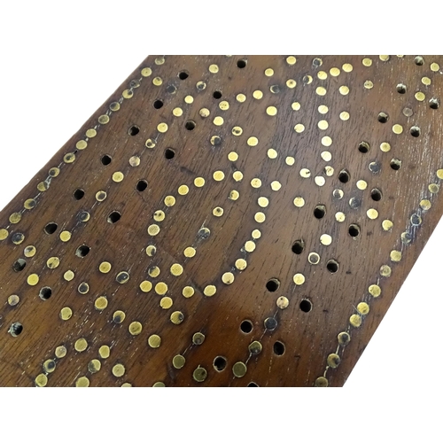 857 - Toys: Three cribbage boards comprising one with a copper mount decorated with flowers, one with inla... 