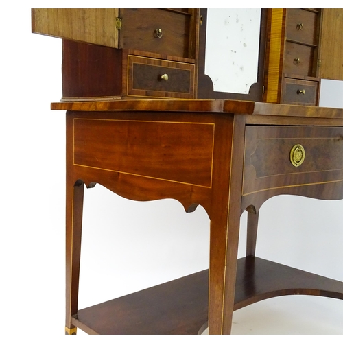 1437 - A 19thC Bonheur du jour, the top having marquetry inlaid doors that open to show three short drawers... 