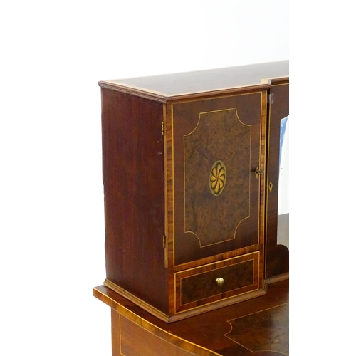 1437 - A 19thC Bonheur du jour, the top having marquetry inlaid doors that open to show three short drawers... 