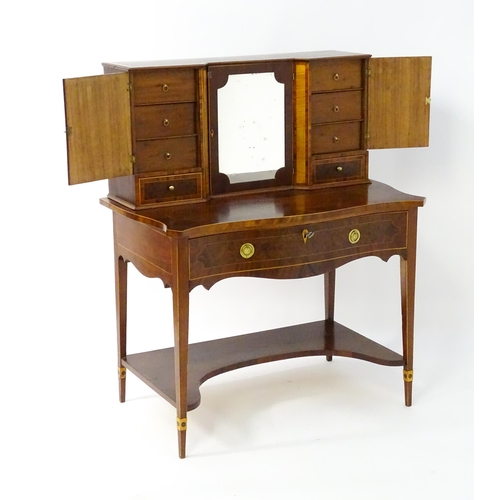 1437 - A 19thC Bonheur du jour, the top having marquetry inlaid doors that open to show three short drawers... 