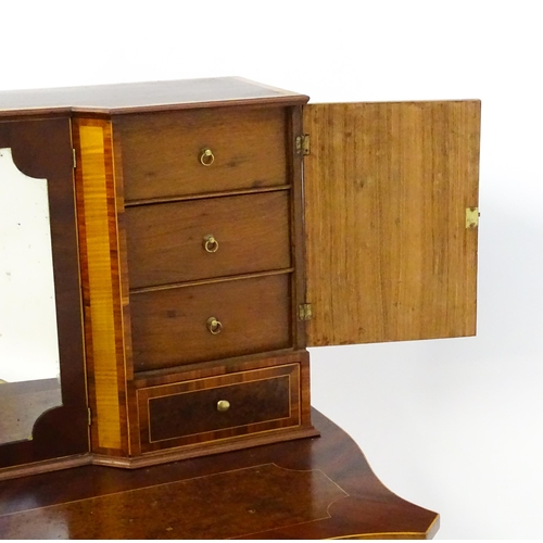 1437 - A 19thC Bonheur du jour, the top having marquetry inlaid doors that open to show three short drawers... 