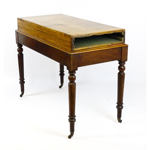 1563 - A Victorian bagatelle on stand raised on four turned tapering legs terminating in brass castors. 50