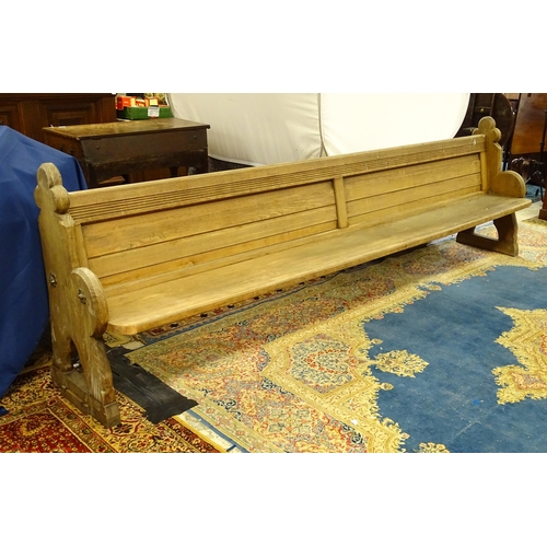 1576 - A Victorian pitch pine church pew , the carved uprights with trefoil terminals , approx 124