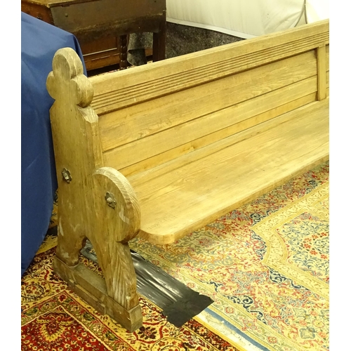 1576 - A Victorian pitch pine church pew , the carved uprights with trefoil terminals , approx 124