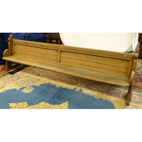 1576 - A Victorian pitch pine church pew , the carved uprights with trefoil terminals , approx 124