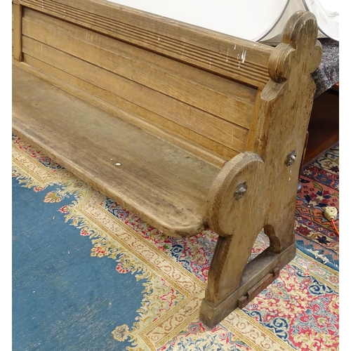 1576 - A Victorian pitch pine church pew , the carved uprights with trefoil terminals , approx 124