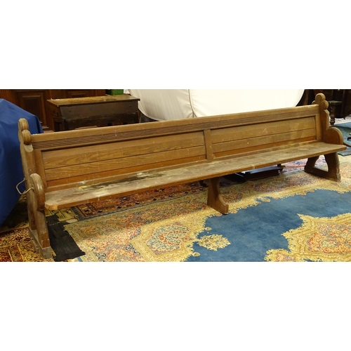 1577 - A Victorian pitch pine church pew , the carved uprights with trefoil terminals , approx 124