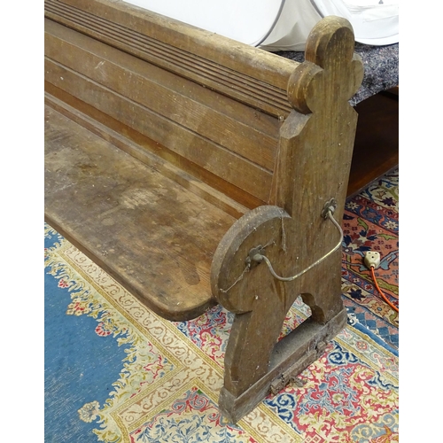 1577 - A Victorian pitch pine church pew , the carved uprights with trefoil terminals , approx 124