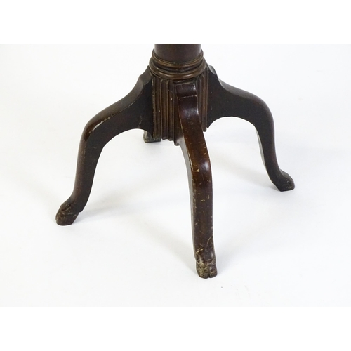 1634 - A 19thC mahogany occasional table with a reeded top above a turned pedestal and four cabriole legs. ... 