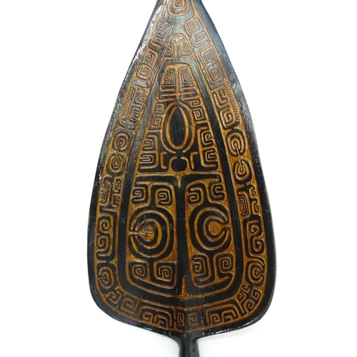 1109 - Ethnographic / Native / Tribal : A 20thC French Polynesian ceremonial paddle with carved banded deco... 