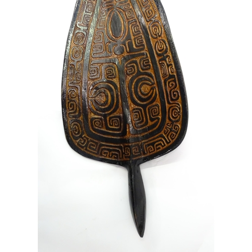 1109 - Ethnographic / Native / Tribal : A 20thC French Polynesian ceremonial paddle with carved banded deco... 