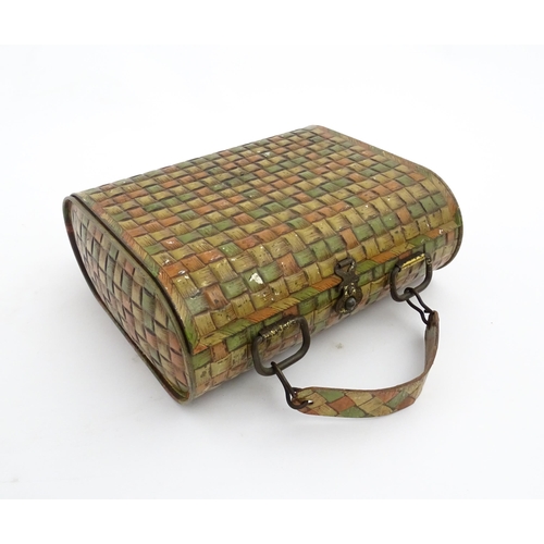 1121 - A Huntley & Palmer novelty biscuit tin formed as a woven picnic basket. Approx. 7