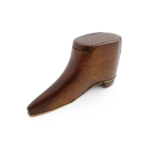 1184 - Treen : A 19thC shoe snuff box with sliding top and satinwood stringing detail to sole. Approx. 2 1/... 