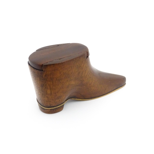 1184 - Treen : A 19thC shoe snuff box with sliding top and satinwood stringing detail to sole. Approx. 2 1/... 