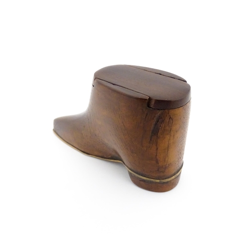 1184 - Treen : A 19thC shoe snuff box with sliding top and satinwood stringing detail to sole. Approx. 2 1/... 