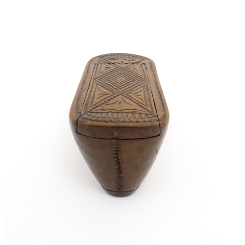 1185 - Treen : A 19thC Continental shoe table snuff box with chip carved decoration to the sliding top. App... 