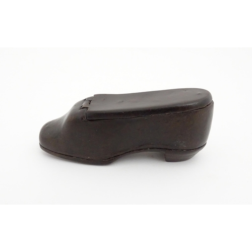 1190 - A 19thC papier mache shoe snuff box with hinged lid. Approx. 3 3/4