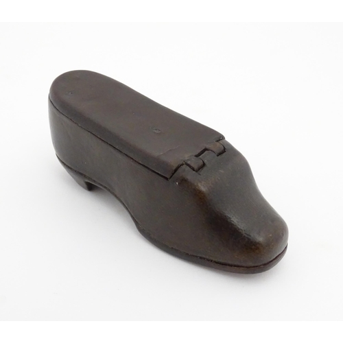 1190 - A 19thC papier mache shoe snuff box with hinged lid. Approx. 3 3/4