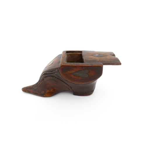 1191 - Treen : A 19thC shoe snuff box of unusual form with sliding lid and inlaid heart decoration. Approx.... 