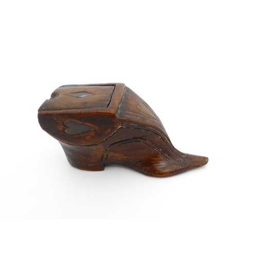 1191 - Treen : A 19thC shoe snuff box of unusual form with sliding lid and inlaid heart decoration. Approx.... 