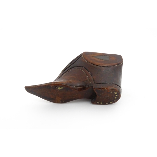 1191 - Treen : A 19thC shoe snuff box of unusual form with sliding lid and inlaid heart decoration. Approx.... 