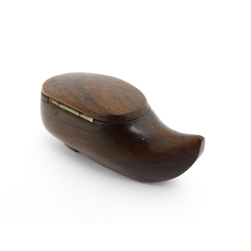 1193 - Treen : A 19thC Continental shoe snuff box of clog form with upturned toe and hinged lid. Approx. 3 ... 