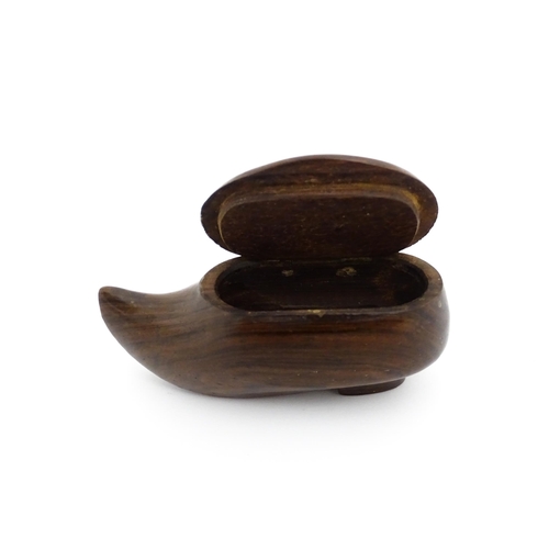 1193 - Treen : A 19thC Continental shoe snuff box of clog form with upturned toe and hinged lid. Approx. 3 ... 