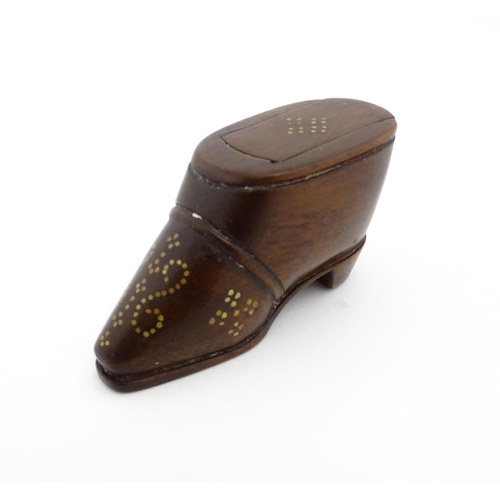 1194 - Treen : A 19thC shoe snuff box with sliding lid and  brass studwork decoration. Approx. 1 3/4