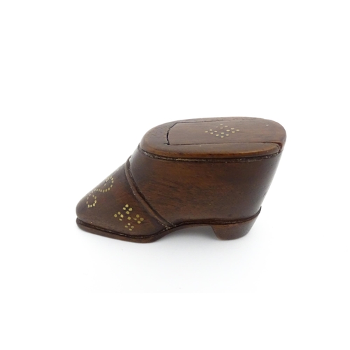 1194 - Treen : A 19thC shoe snuff box with sliding lid and  brass studwork decoration. Approx. 1 3/4