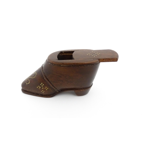 1194 - Treen : A 19thC shoe snuff box with sliding lid and  brass studwork decoration. Approx. 1 3/4