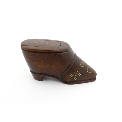 1194 - Treen : A 19thC shoe snuff box with sliding lid and  brass studwork decoration. Approx. 1 3/4