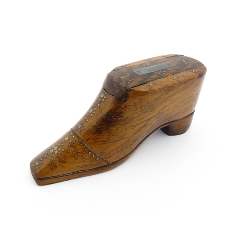 1195 - Treen : A 19thC shoe snuff box with sliding lid and inlaid brass studwork decoration. Approx. 3 3/4