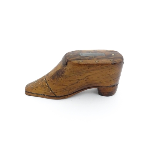 1195 - Treen : A 19thC shoe snuff box with sliding lid and inlaid brass studwork decoration. Approx. 3 3/4