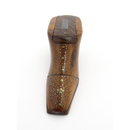 1195 - Treen : A 19thC shoe snuff box with sliding lid and inlaid brass studwork decoration. Approx. 3 3/4