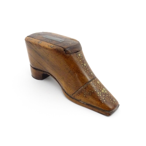 1195 - Treen : A 19thC shoe snuff box with sliding lid and inlaid brass studwork decoration. Approx. 3 3/4