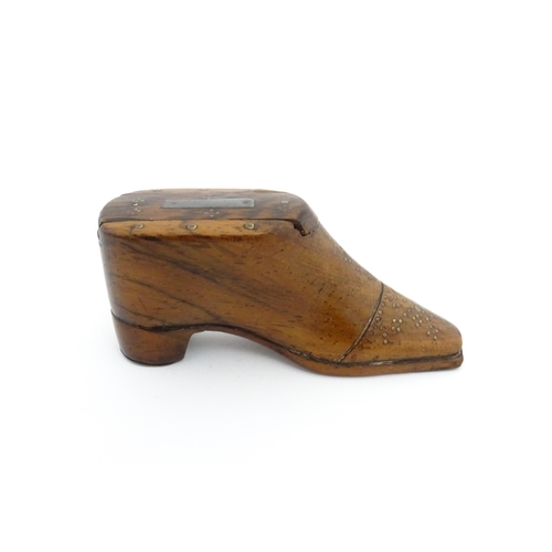 1195 - Treen : A 19thC shoe snuff box with sliding lid and inlaid brass studwork decoration. Approx. 3 3/4