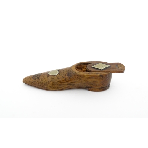 1198 - Treen : A 19thC shoe snuff box with sliding top and inlaid heart and diamond detail. Approx. 3