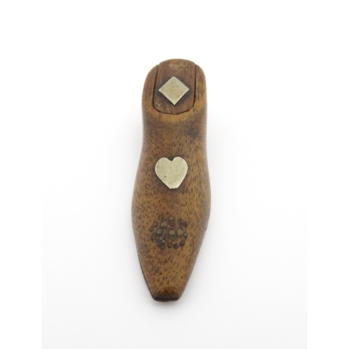 1198 - Treen : A 19thC shoe snuff box with sliding top and inlaid heart and diamond detail. Approx. 3