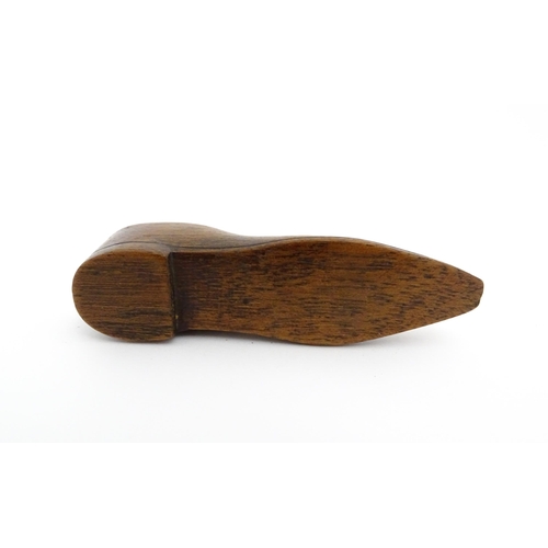 1198 - Treen : A 19thC shoe snuff box with sliding top and inlaid heart and diamond detail. Approx. 3