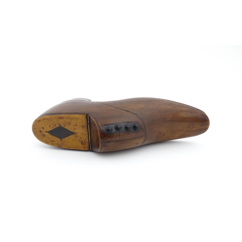 1204 - Treen : A late 19th / early 20thC table shoe snuff box with incised detail, the hinged lid with inla... 