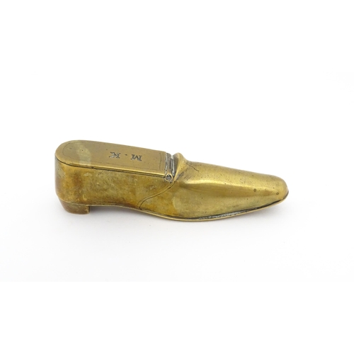 1209 - A 19thC brass shoe snuff box the hinged lid with the initials M. K. Approx. 3 3/4