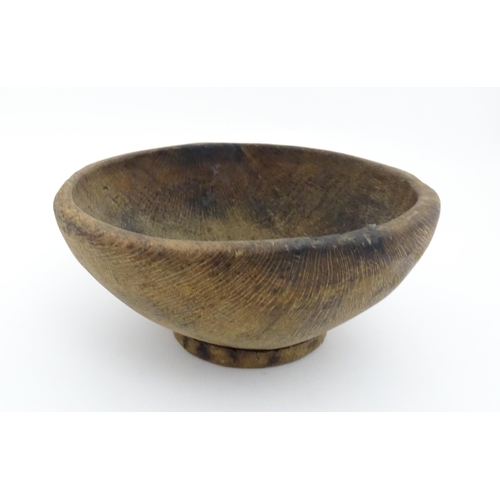 1211 - Treen : A 19thC Spanish carved wooden shepherd's bowl. Approx. 4 1/2