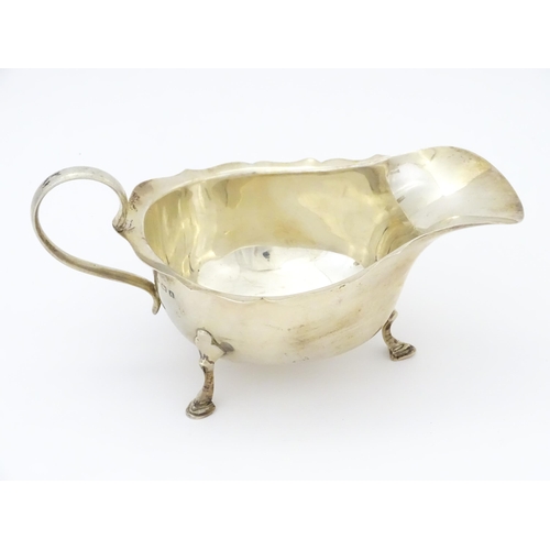 324 - A silver sauce boat hallmarked Birmingham 1925 maker A & J Zimmerman Ltd. Approx 6
