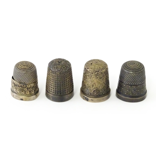 330 - Four assorted silver thimbles to include an example hallmarked Birmingham 1901 maker Henry Griffith ... 